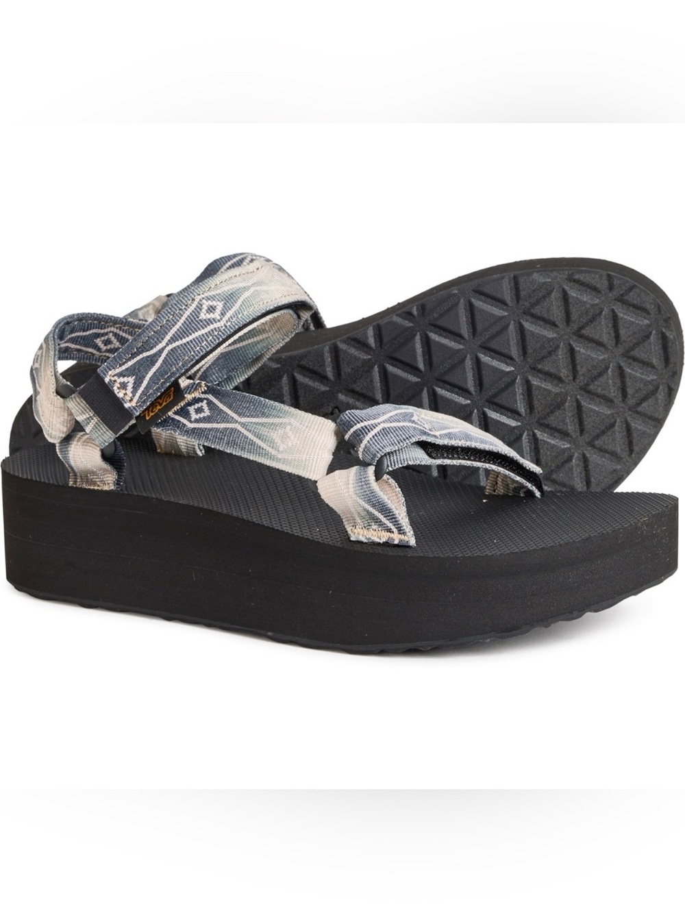 Teva flat form sandals . Fabric upper/ rubber sole. Size 8 . NWT.